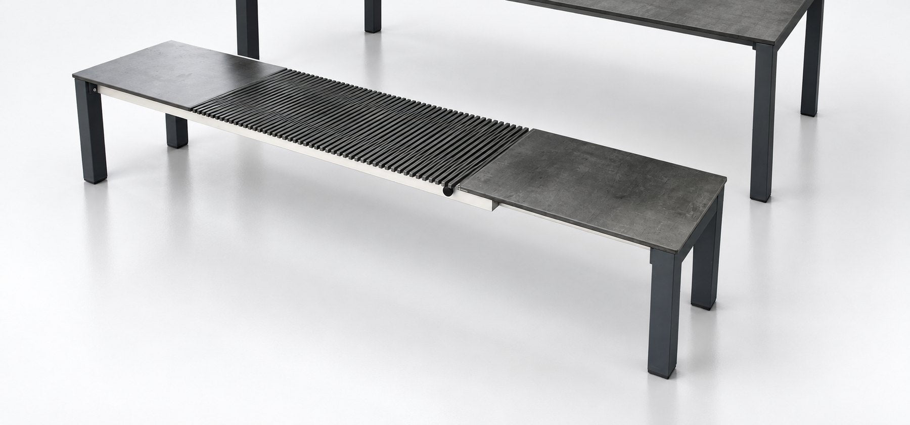 The outdoor bench open, with its lattice of slats