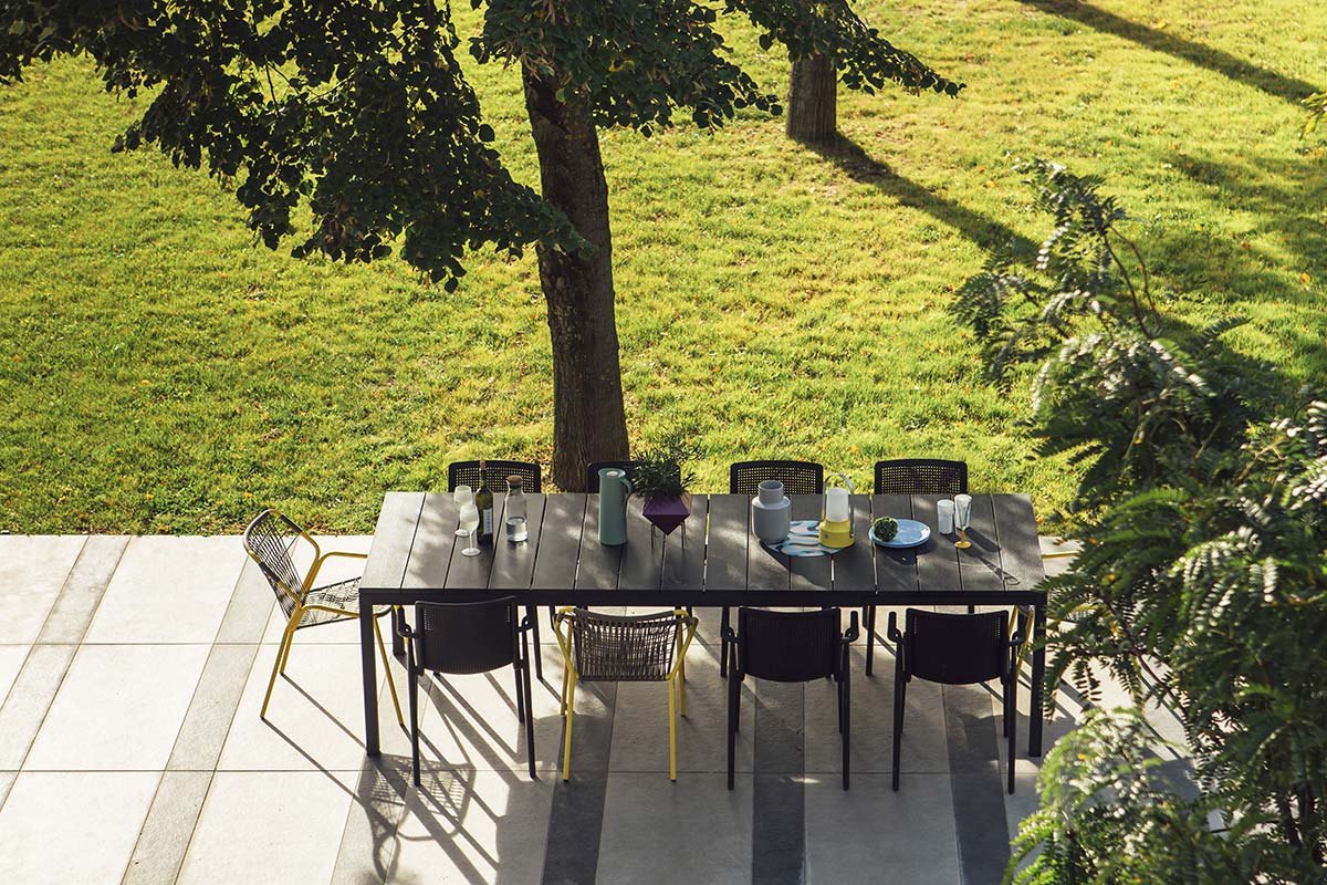 Kapua chairs around an outdoor dining table