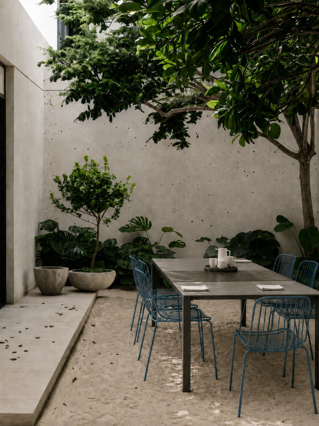 The outdoor table in a stone courtyard