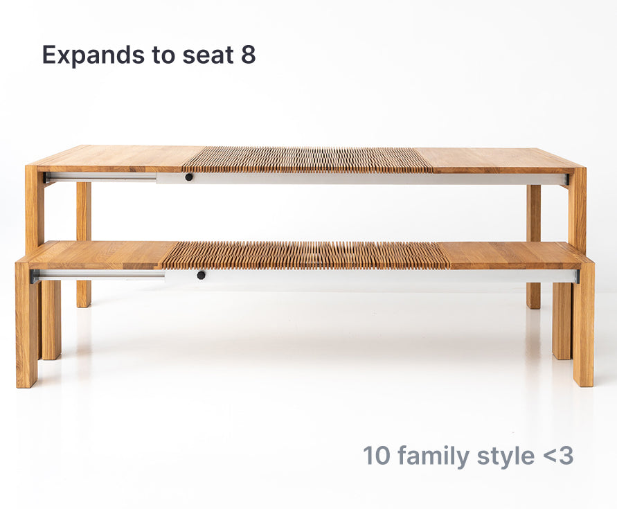 Wooden table and bench on a white background with text 'Expands to seat 8, 10 family style'.