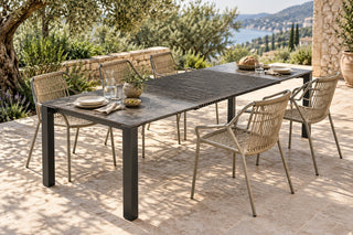 Kapua chairs in Pebble Grey around the Accordion Table Outdoor