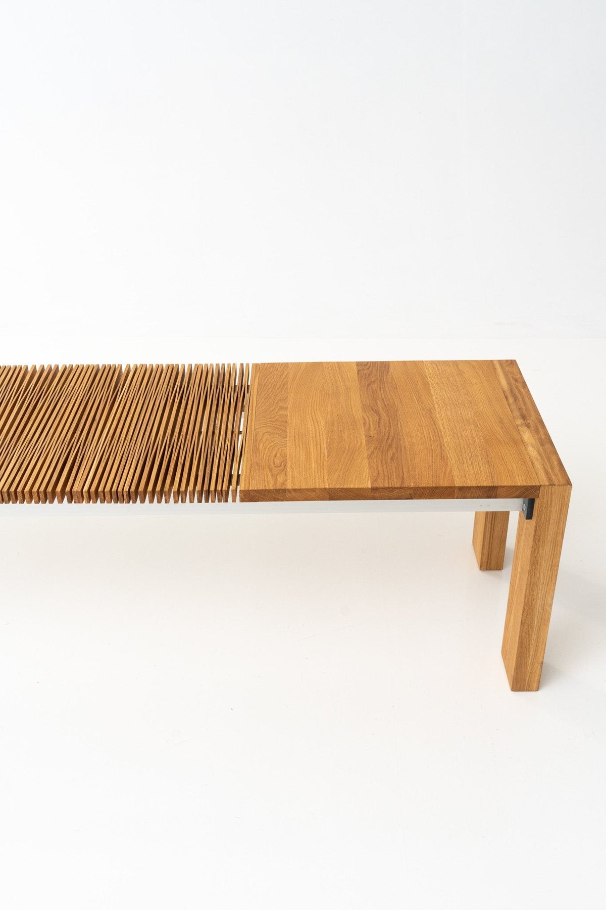 The bench open, with its lattice of oak slats