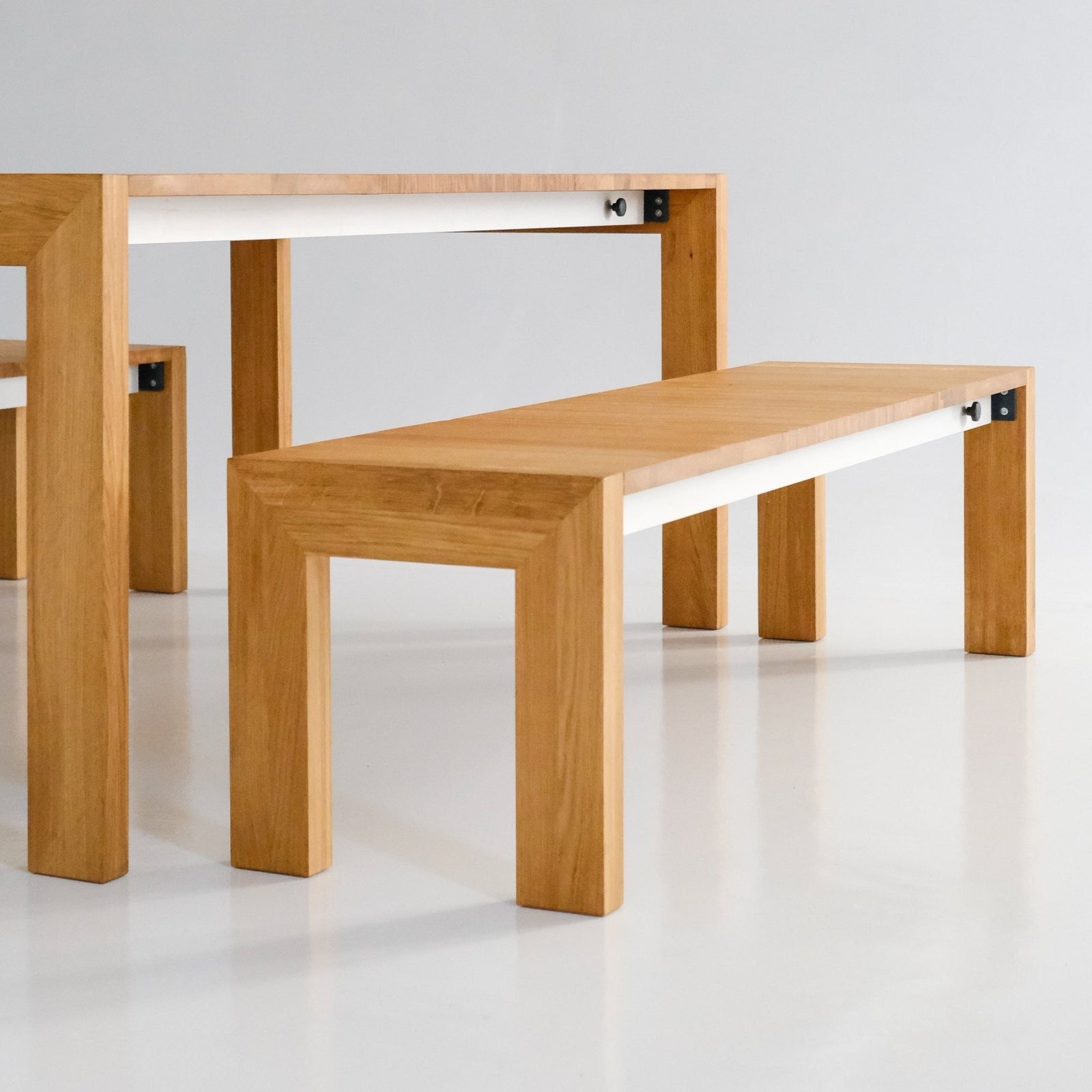 The bench beside the oak table