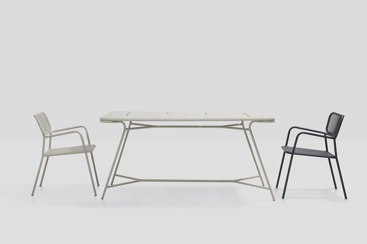 Totem chairs beside a table in a studio
