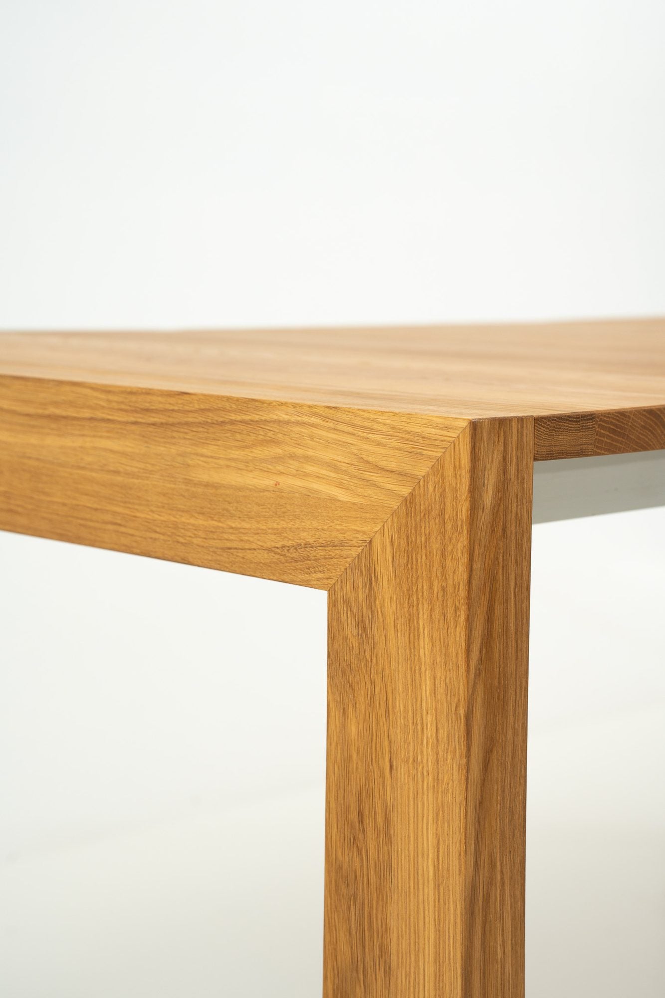 A solid oak corner, where the top meets the leg