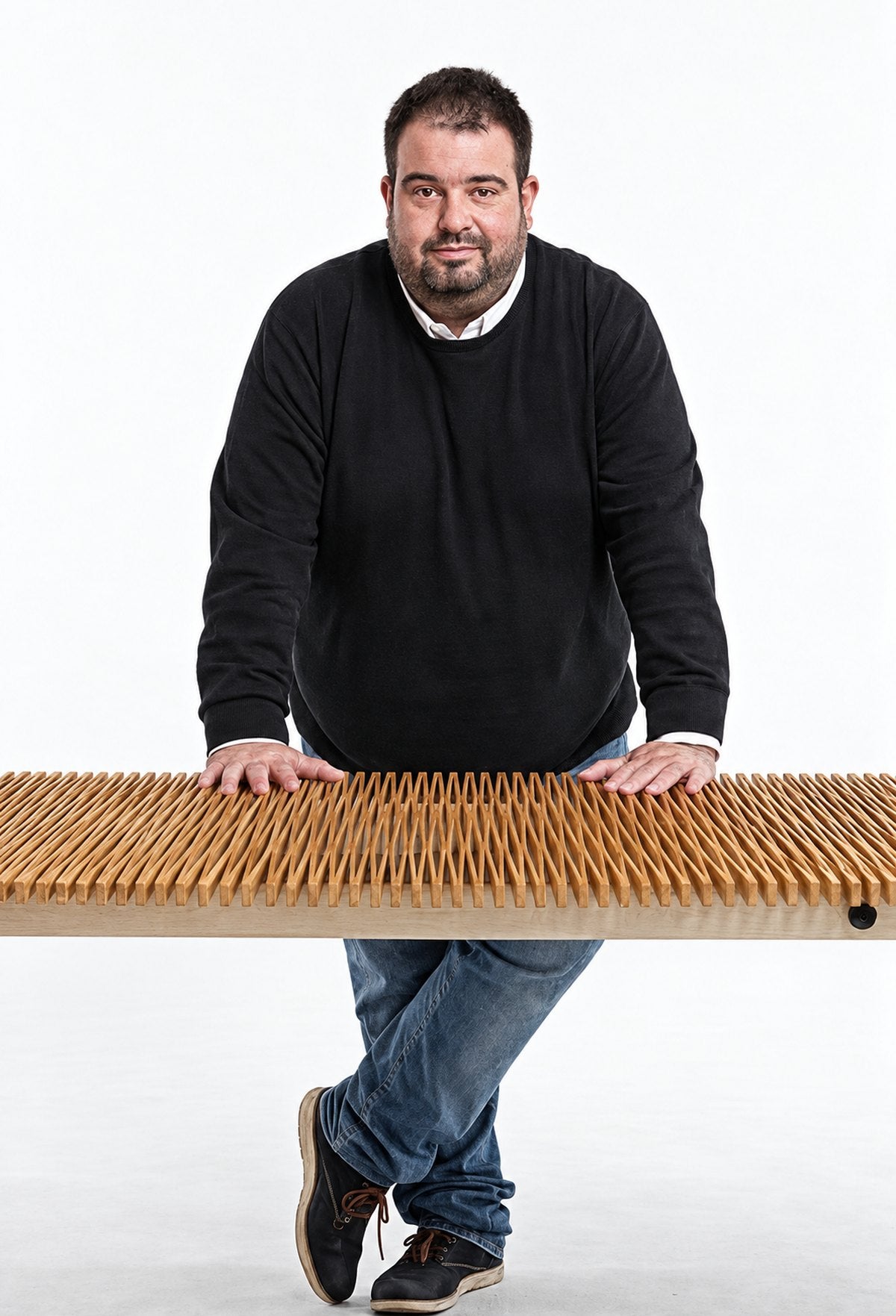 Hrvoje Vampovac leaning on the open Accordion Table